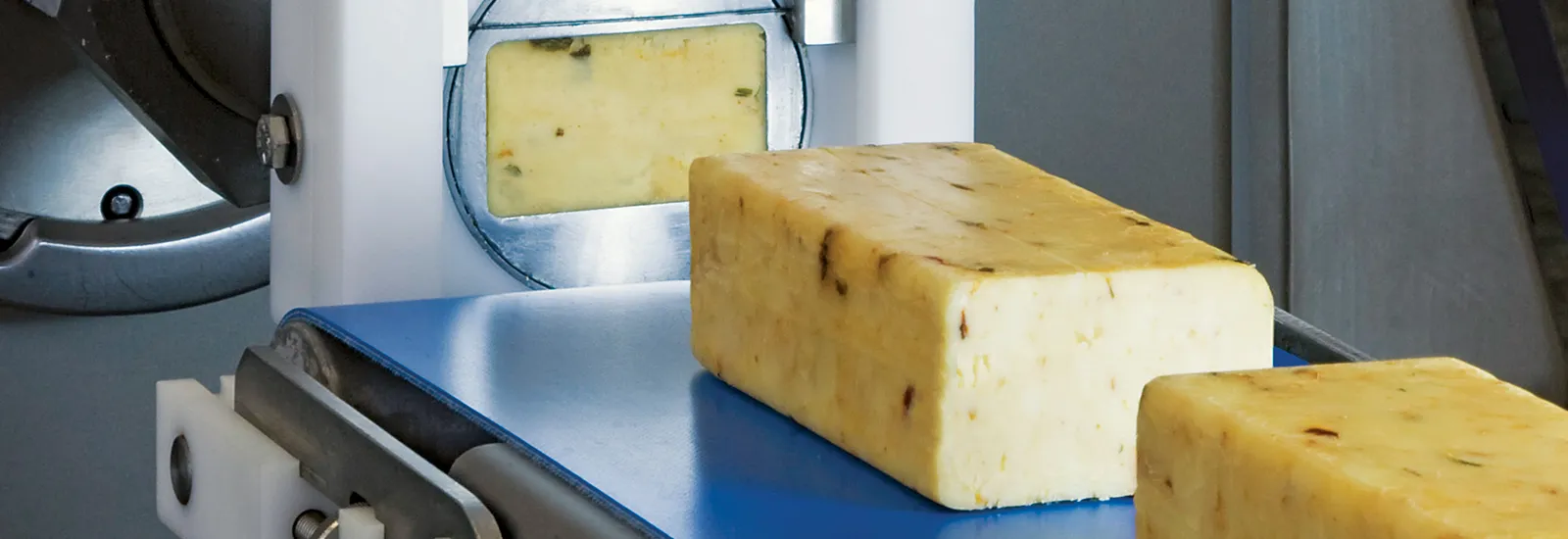 Cheese block on a processing machine