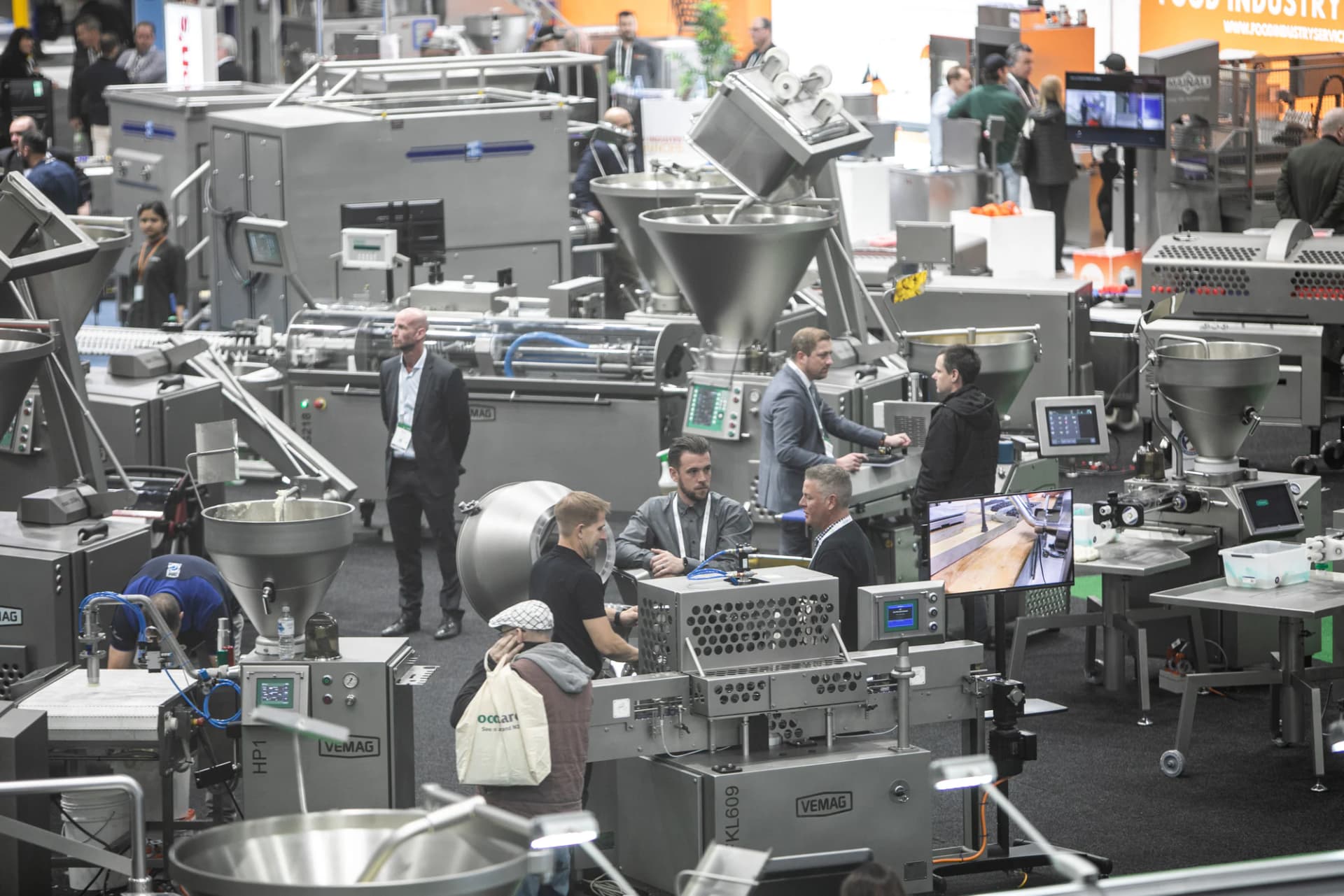 Busy VEMAG stand with many machines on display