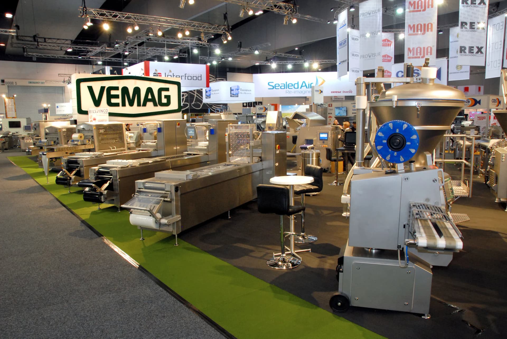 Forming line with blue conveyor under the VEMAG sign