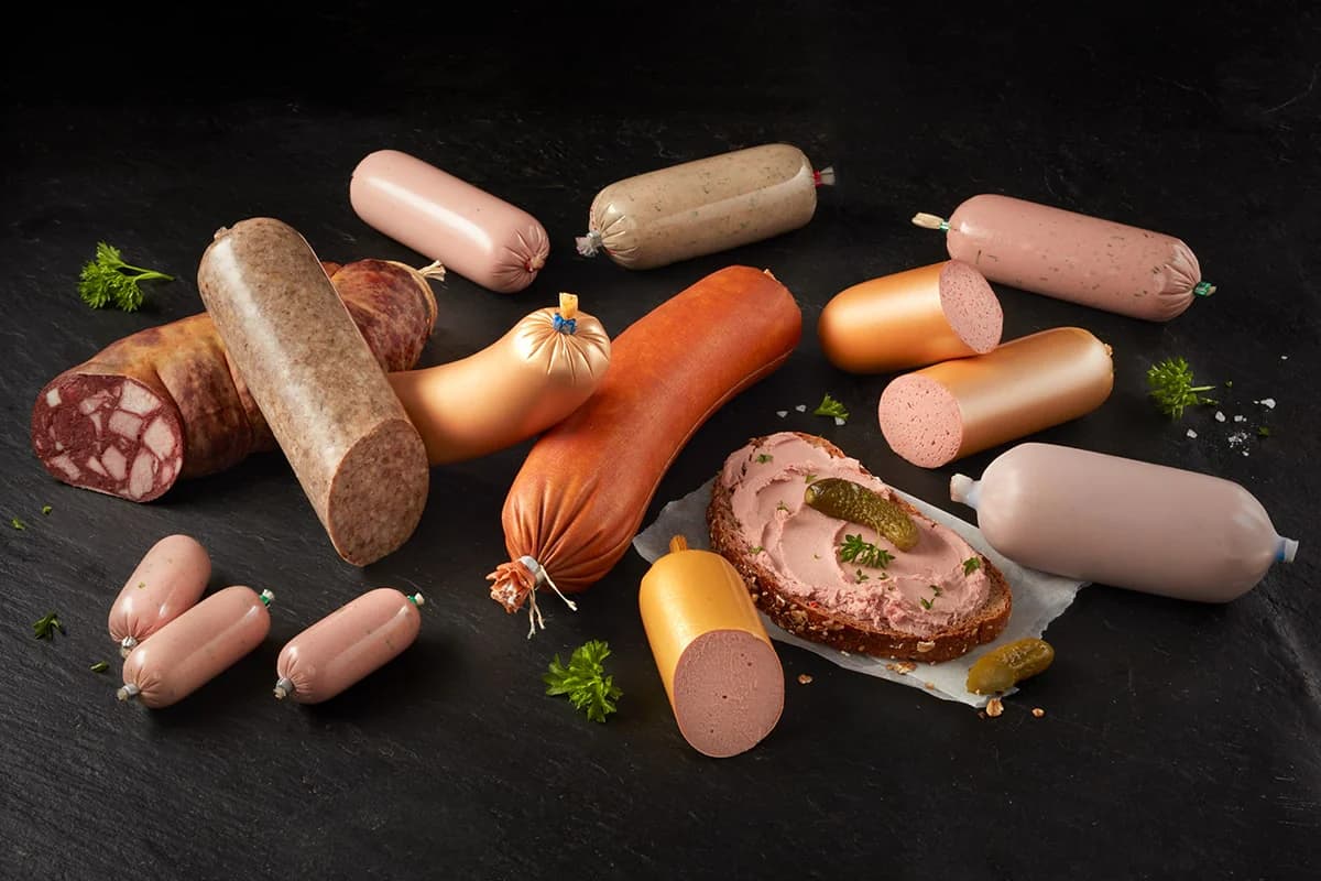 Range of cooked sausages and deli products